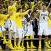 The Michigan bench celebrates after a score in the game against Illinois on Sunday, Feb. 24. Michigan won 71-58. Daniel Brenner I AnnArbor.com